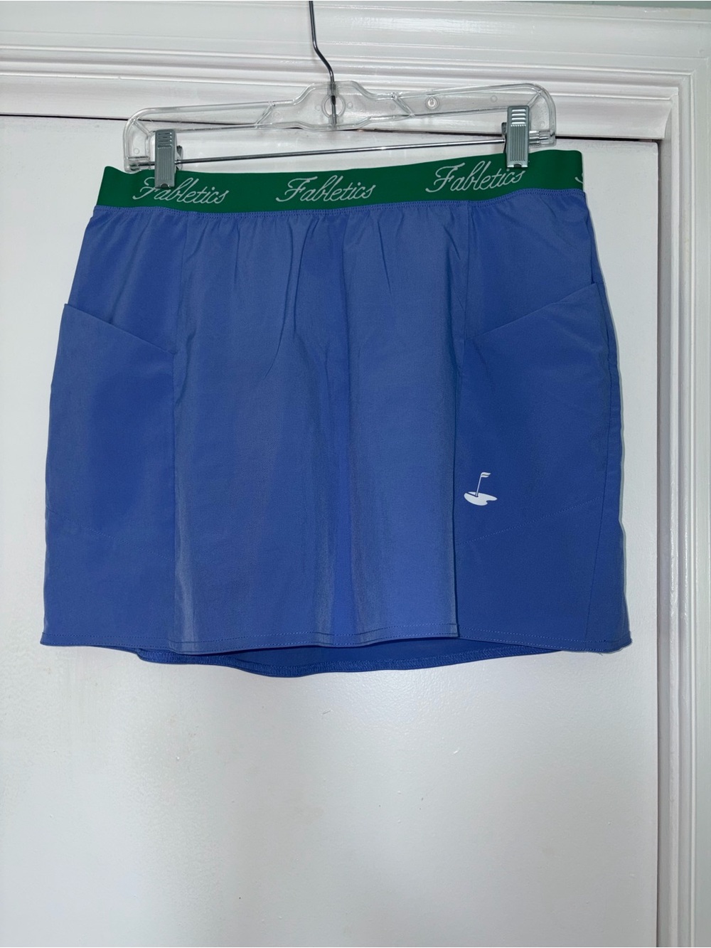 Fabletics Blue Mini Skort with Green Branded Waistband